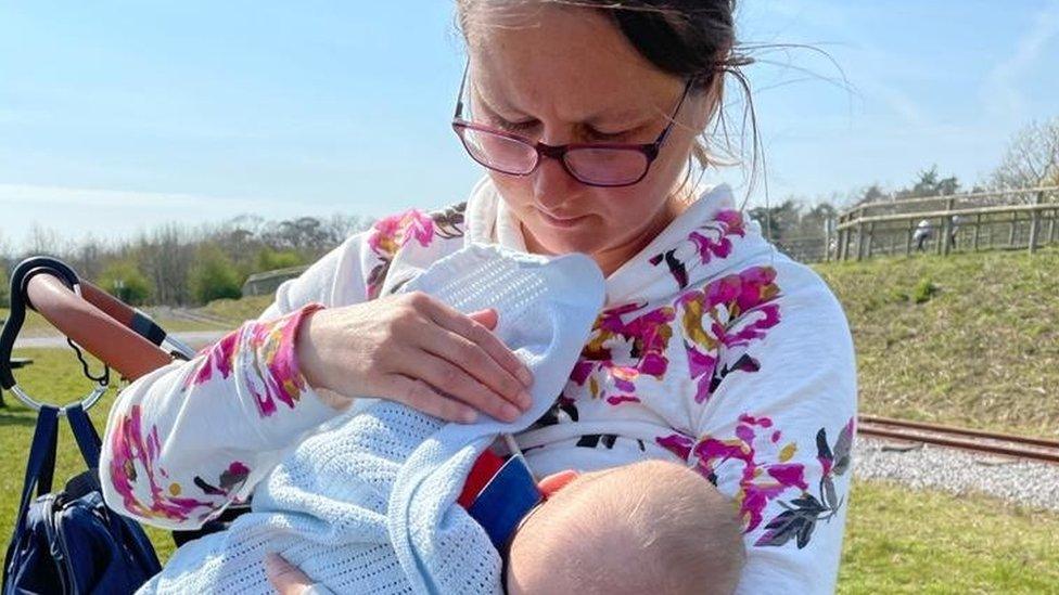 Katherine Jones feeding her baby