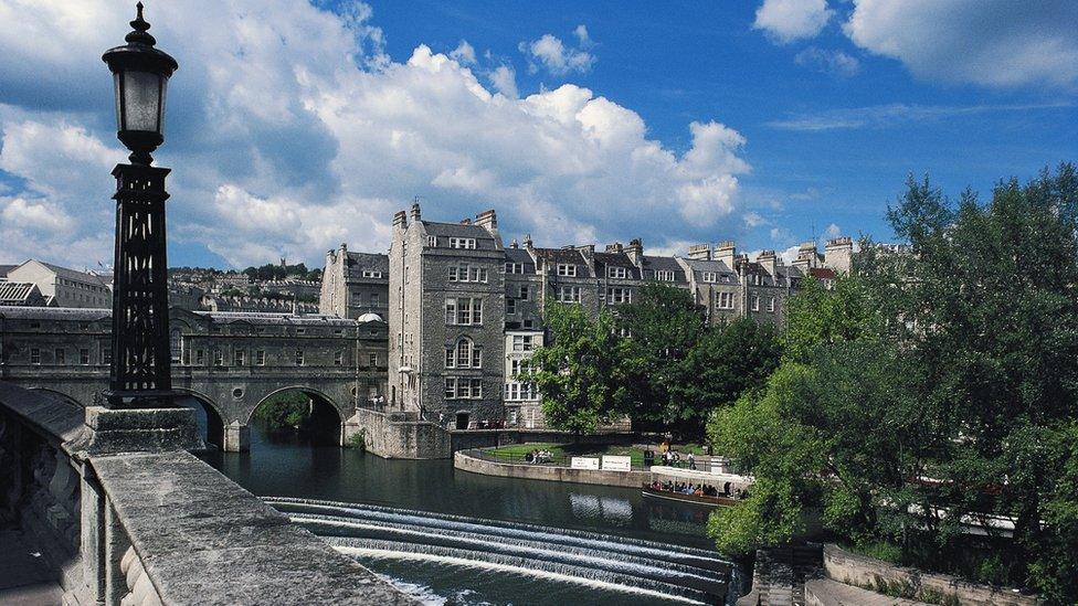 The town of Bath, seen from Pulteney Bridge on the River Avon