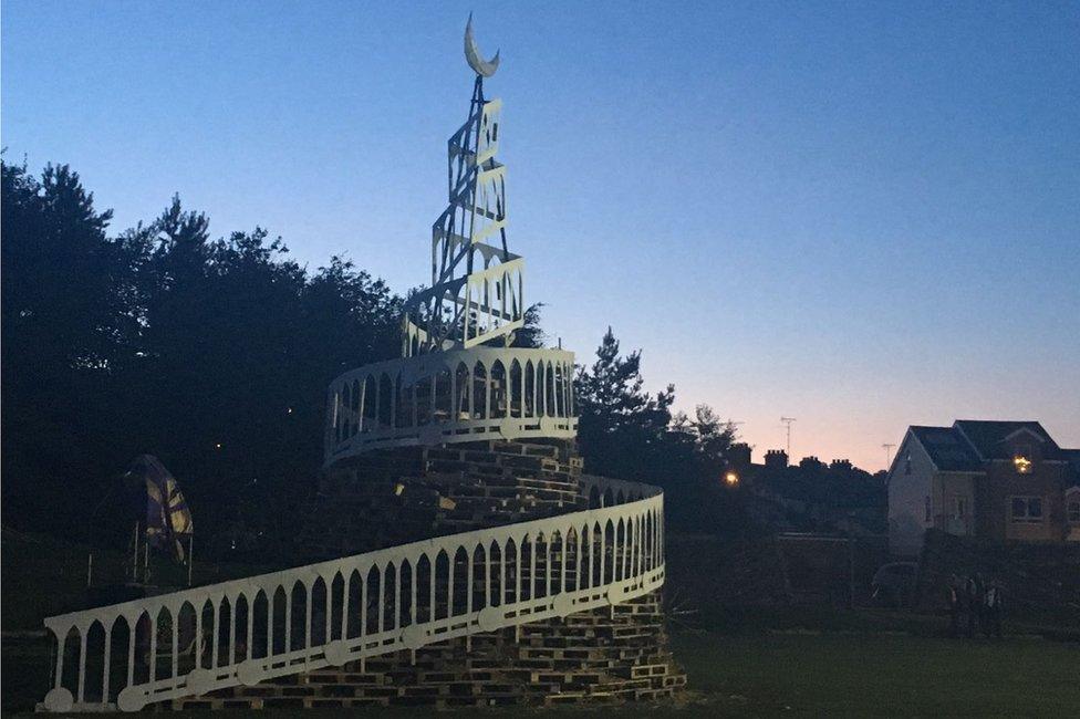 A separate, controlled bonfire without any flags or emblems was built a short distance away