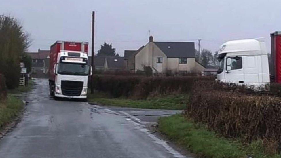 two HGVs on roads near Castle Eaton Farm