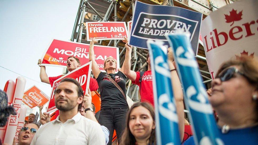 Canadian voters outside a debate before the 2015 federal election