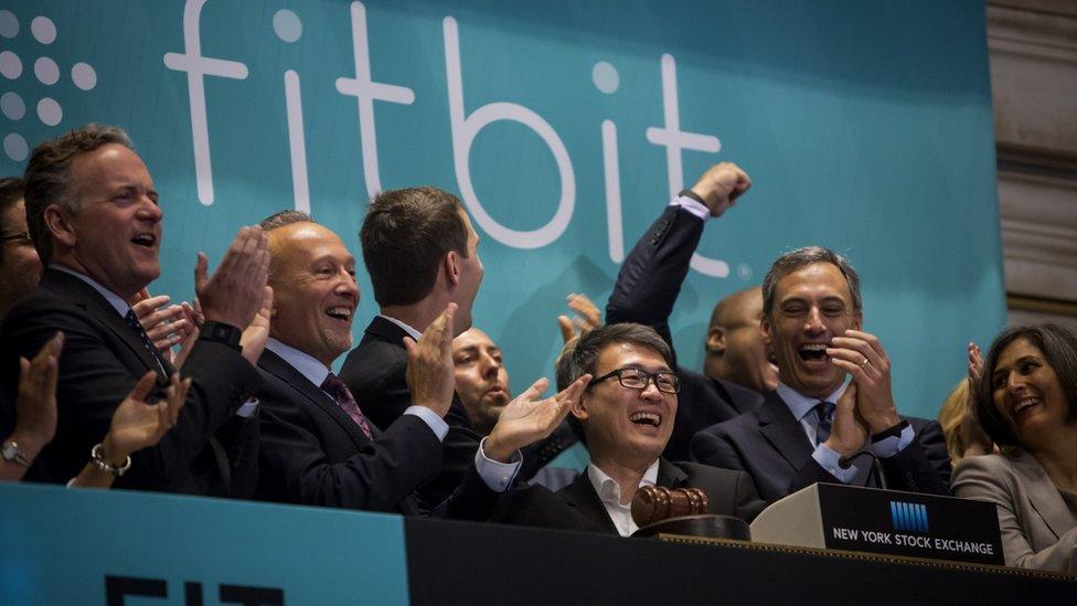 Fitbit ringing bell on Wall Street