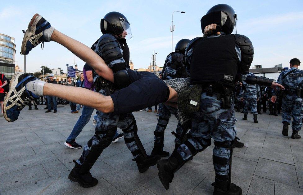 Police and protesters in Moscow, 27 July