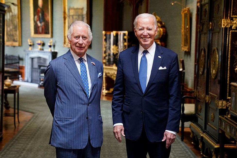 King Charles III and US President Joe Biden in the Grand Corridor at Windsor Castle, Berkshire, on 10 July 2023