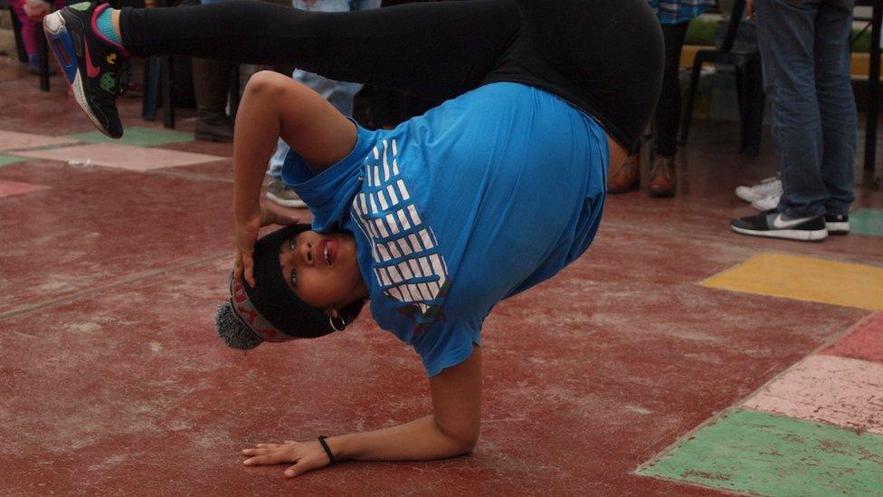 A street dancer performing during the first 'Llaqta funk' festival in Lima, Peru