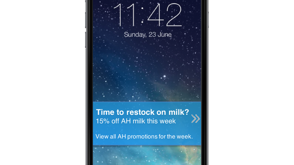 A smartphone screen with an offer suggesting it's time to restock milk