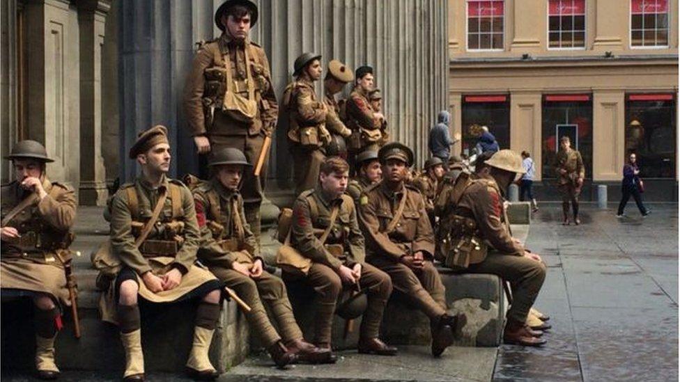 Soldiers dressed in WW1 uniform in Royal Exchange Square in Edinburgh