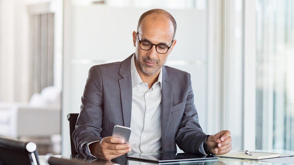 Businessman using mobile phone