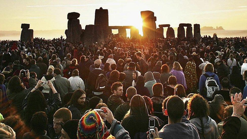 People gathered at Stonehenge