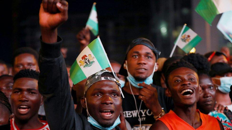 Demonstrators shout slogans during a protest over alleged police brutality in Lagos, Nigeria October 17, 2020