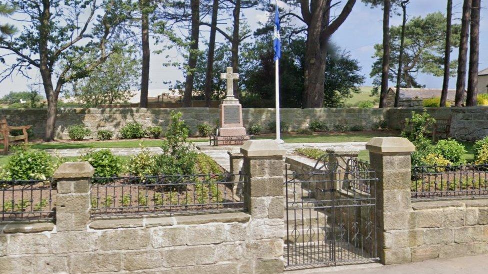 Streetview of the war memorial in a gated garden