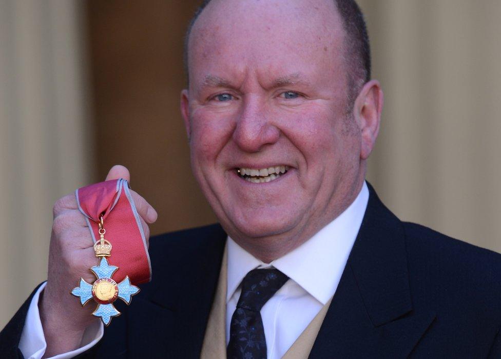 Ian Livingstone with his CBE