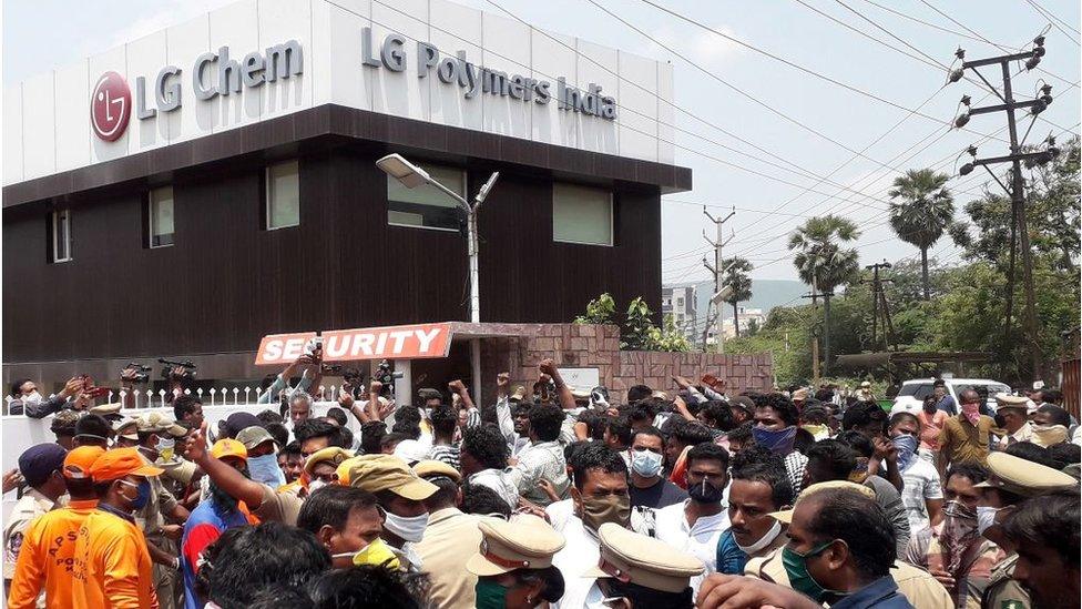 Residents protest in front of LG Polymers plant demanding justice to the gas leak victims, in Visakhapatnam