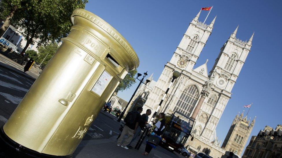 A gold post box near Westminster Abbey