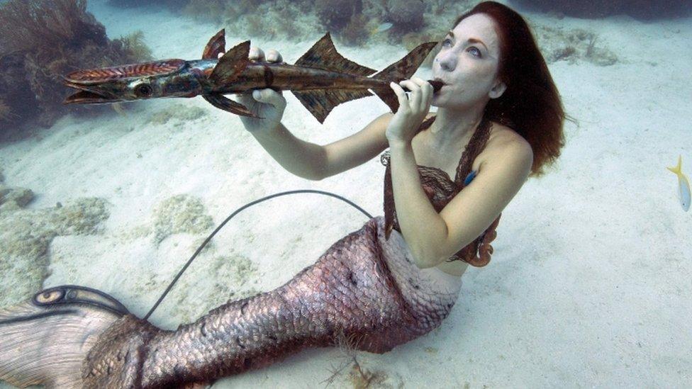 Mariah Reynolds, garbed as a mermaid