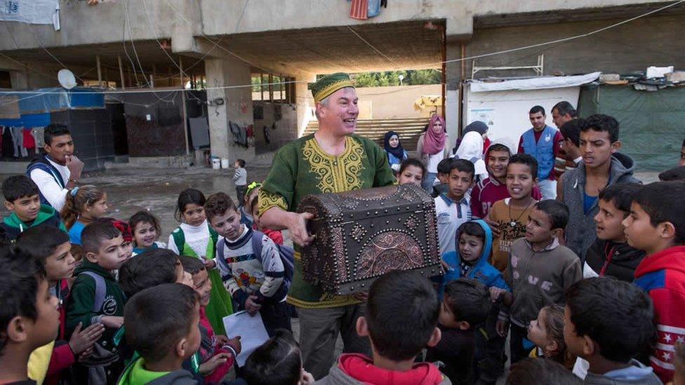 Jamie Jibberish entertaining children in Beirut