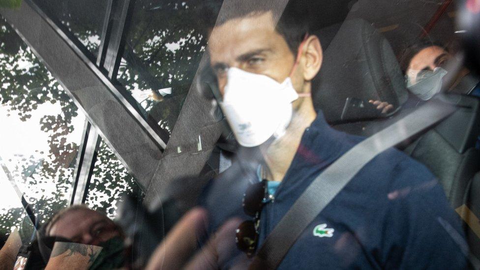 Serbian tennis player Novak Djokovic leaves the Park hotel on January 16, 2022 in Melbourne, Australia.