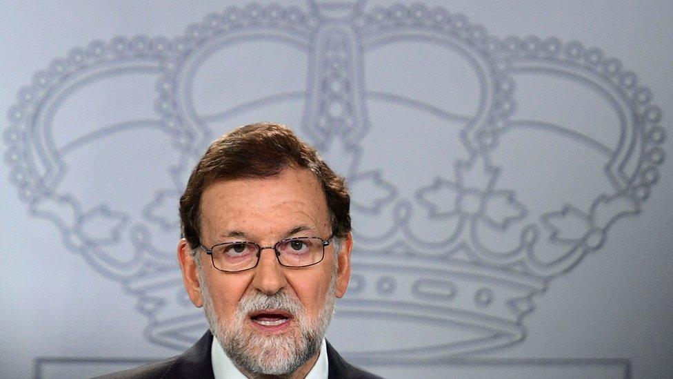 Spanish Prime Minister Mariano Rajoy attends a press conference at La Moncloa palace in Madrid