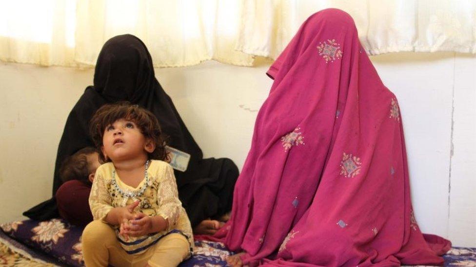 Afghans who were freed by Afghan security forces from a prison run by Taliban militants, are brought to a military base in Helmand, Afghanistan, 31 May 2018.