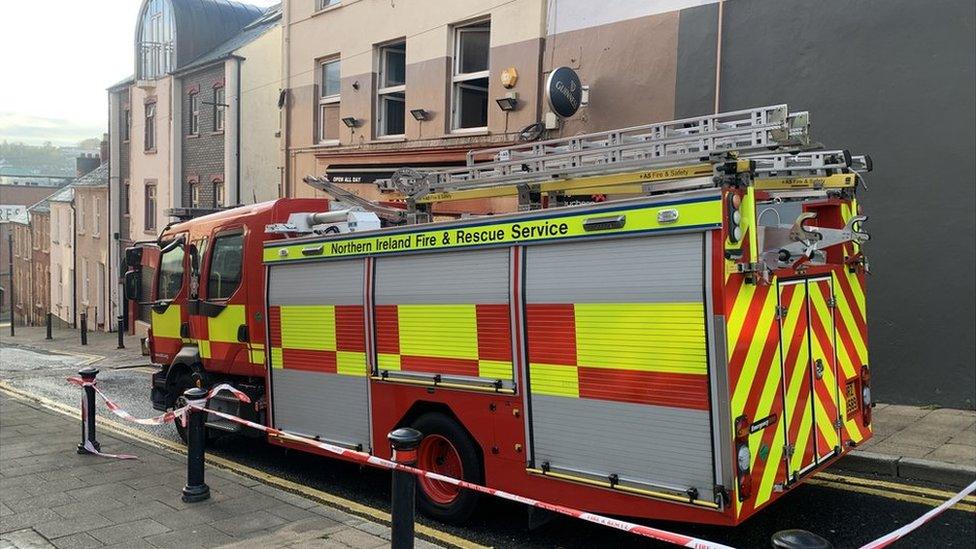 Fire service and police at the scene of the fire in Londonderry