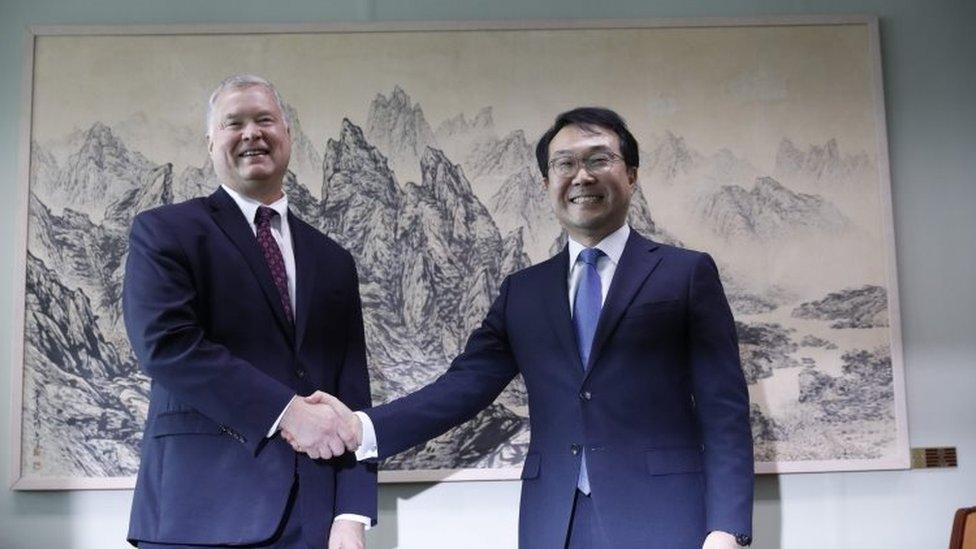 US special envoy for North Korea Stephen Biegun shakes hands with his South Korean counterpart Lee Do-hoo