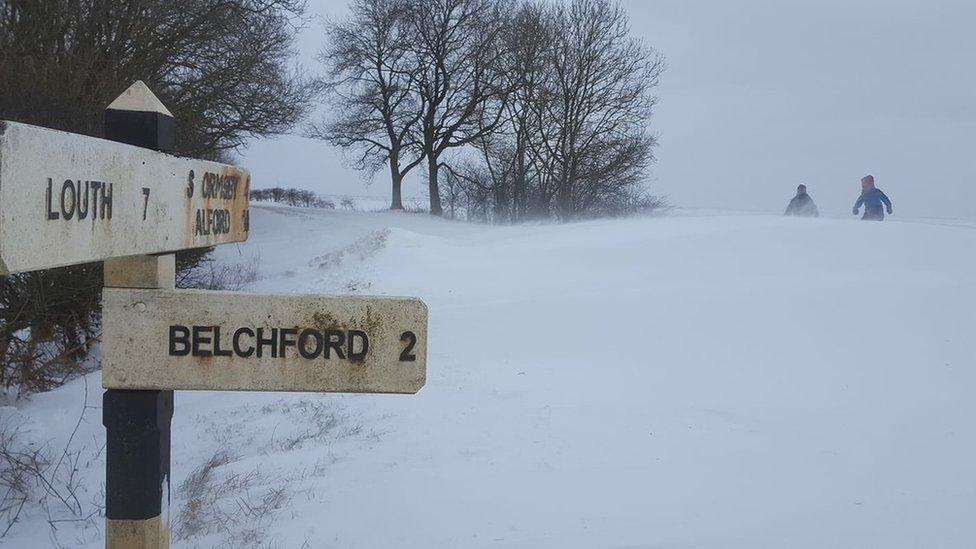 Road sign in snow