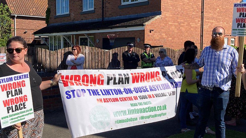 Protesters at meeting