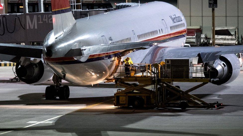 Plane on tarmac before deportation flight from Germany, file pic (Feb 2017)