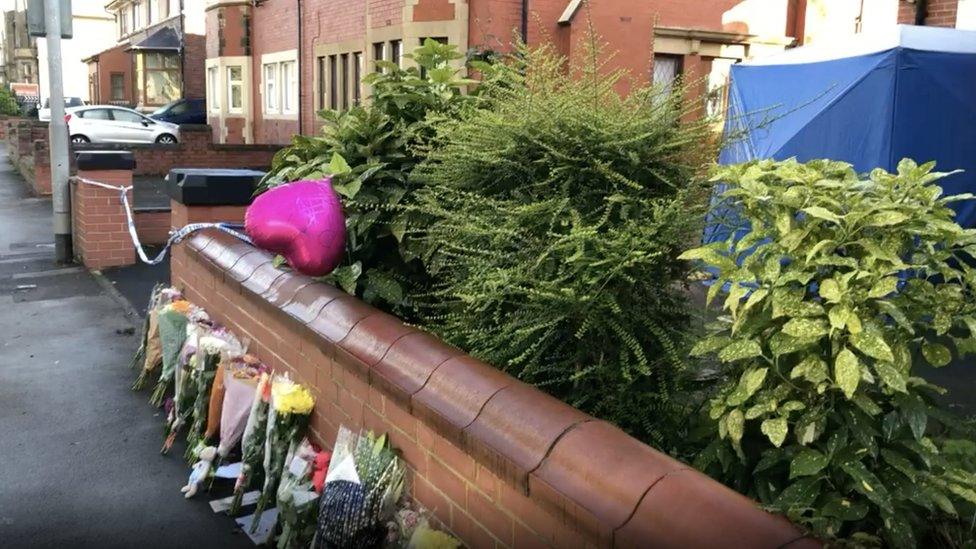 Floral tributes at scene of the deaths of mother and daughter