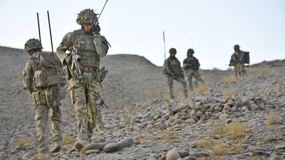 Soldiers from the 1st Battalion Royal Regiment Fusiliers conduct a dawn foot patrol in the Nahr-e Saraj district, Helmand Province, Afghanistan