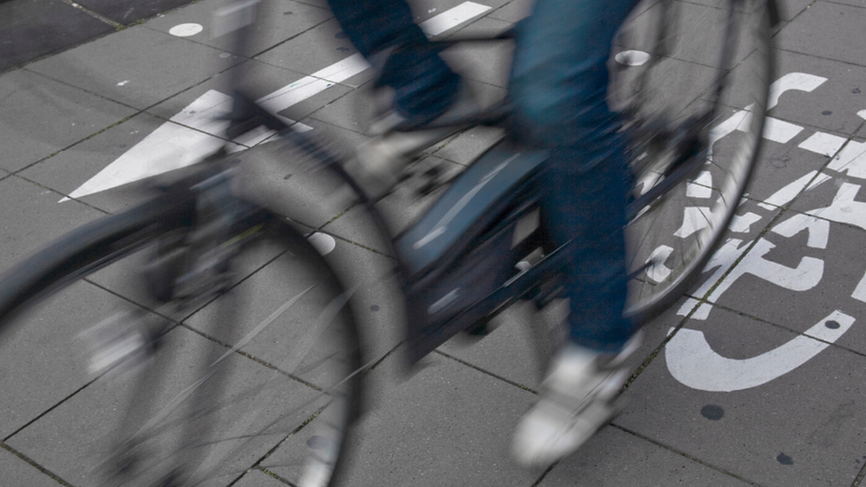 Cycle being ridden on a cycle path