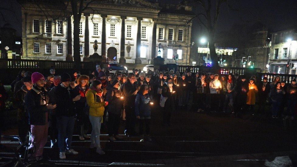 Members of the public attend a candle-lit vigil at Dalton Square, Lancaster, in memory of transgender teenager Brianna Ghey