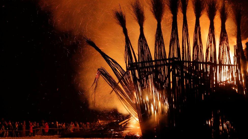 A Flaming Gothic art project marks the Maslenitsa holiday at the Nikola Lenivets art park, near Kaluga, on 17 February 2018.