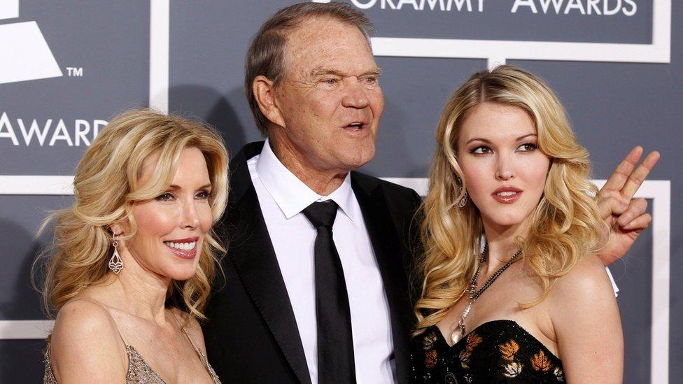 Glen Campbell with his wife Kim (L) and daughter Ashley at the Grammy Awards in Los Angeles in 2012