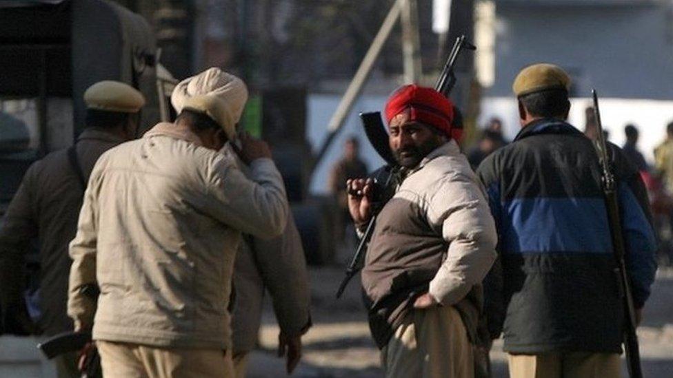 Indian security personnel stand guard outside the Indian Air Force (IAF) base at Pathankot in Punjab, India, January 2, 2016.