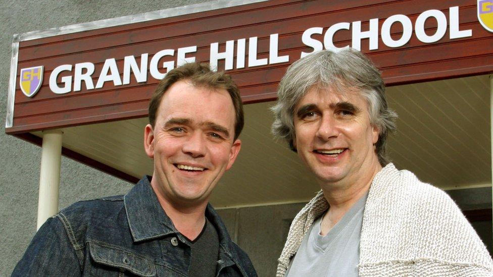 Todd Carty, who played Tucker Jenkins in Grange Hill, alongside the show's creator Phil Redmond in 2003