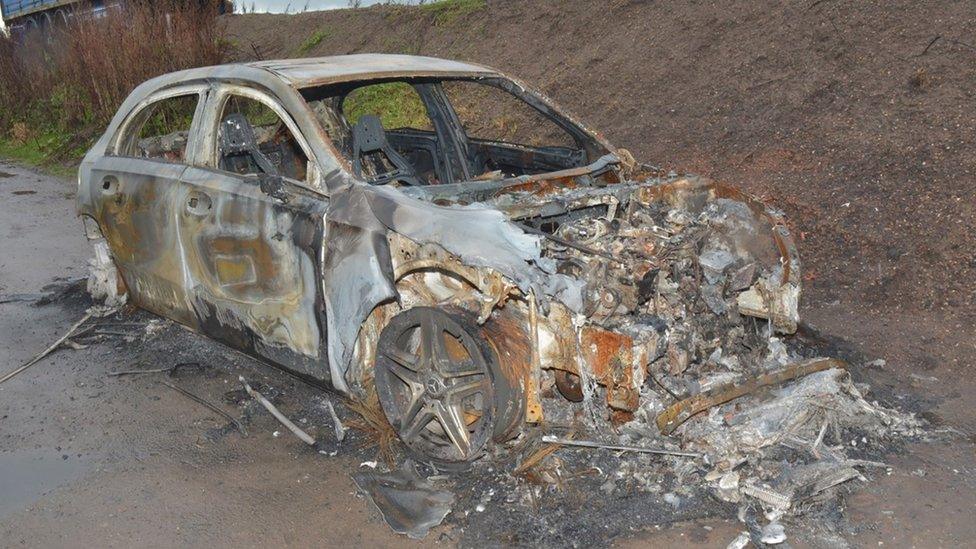 Remains of car the prosecution said was used in a shooting