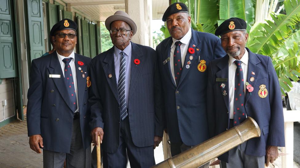 From left to right: Pagget Messiah, Maurice Appleton, Johnson Browne and Keith Eastmond pose for a photo