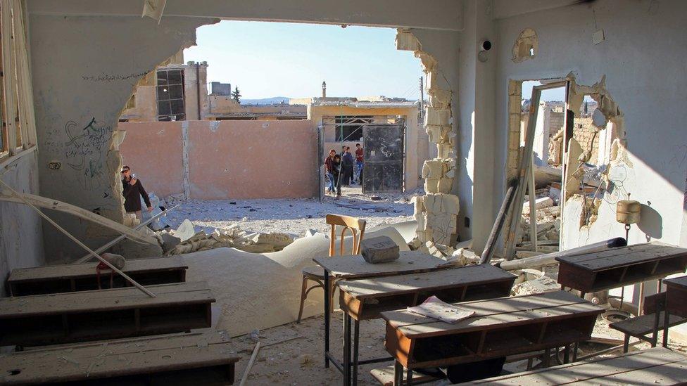 Damaged classroom at a school hit in a reported air strike in the village of Hass, Idlib province (26 October 2016)