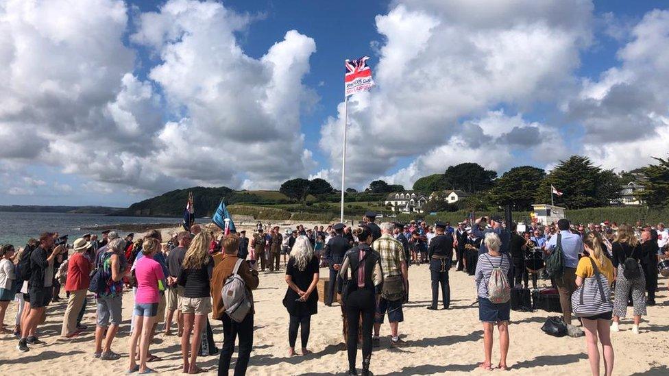 Armed Forces Day flag on beach in Falmouth