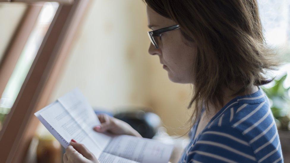 Tenant looks at letter