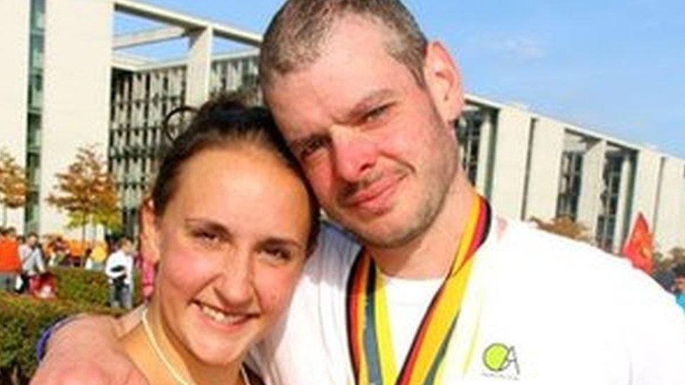 Ben Ashworth with wife Louise and his six medals