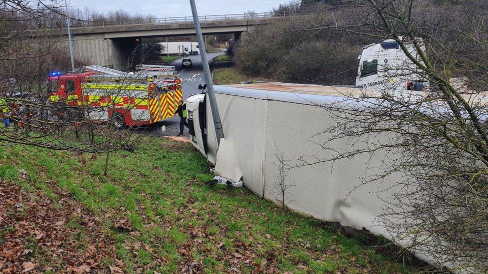 Overturned lorry on the A14/A45 roundabout at Thrapston