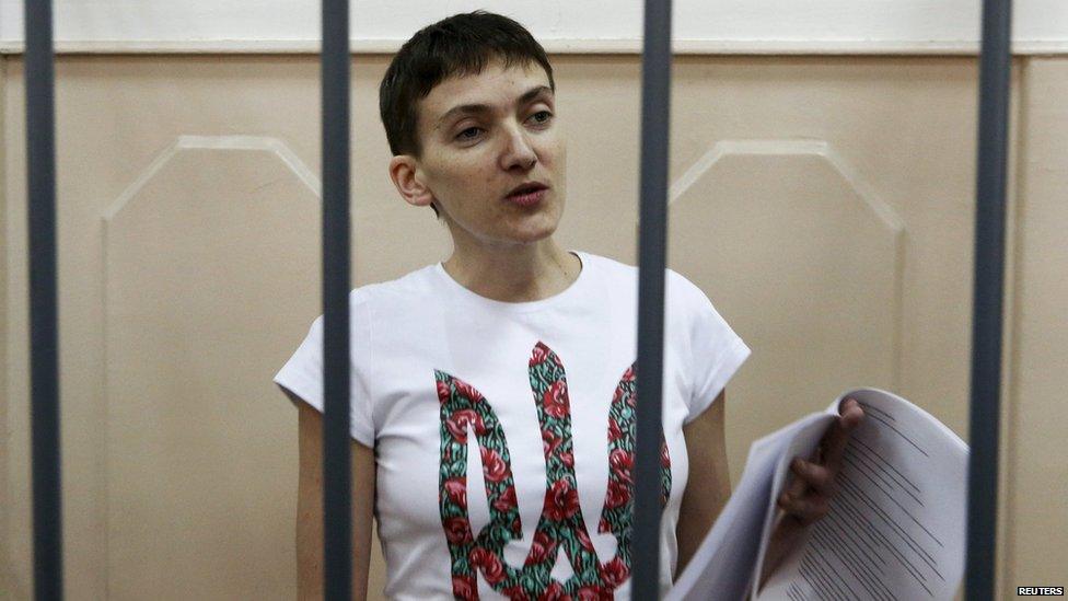 Ukrainian military pilot Nadia Savchenko stands inside a defendants' cage as she attends a court hearing in Moscow, Russia (6 May 2015)