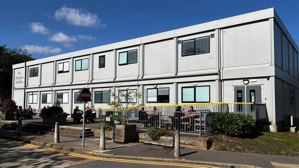 White coloured temporary building of a modular design