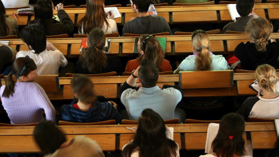 People sitting in lecture theatre