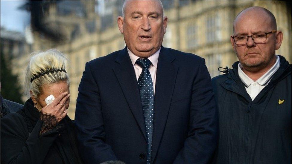 Charlotte Charles, Radd Seiger and Tim Dunn outside the Houses of Parliament