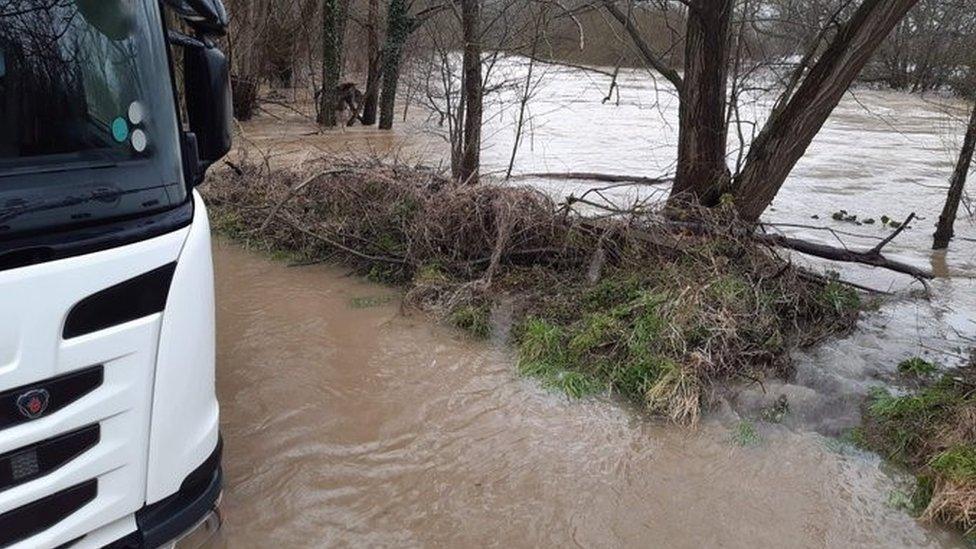 Lorry trapped in floodwater near Welshpool