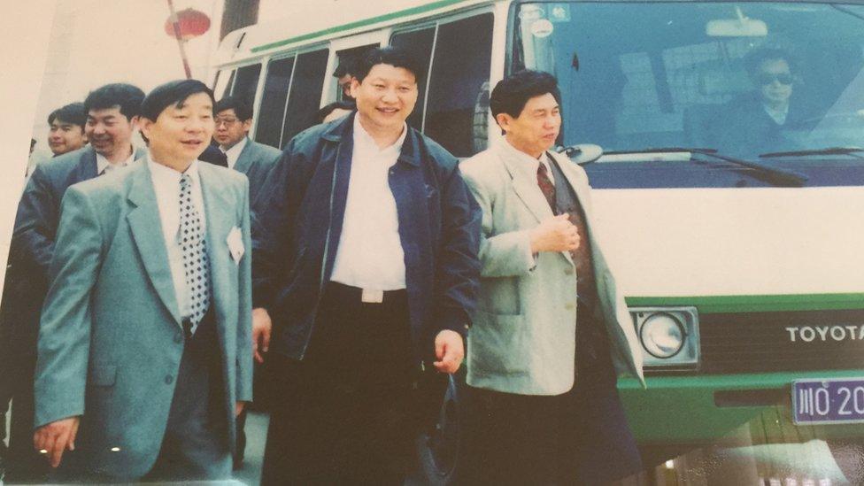 Mr Wang meeting current Chinese president Xi Jinping many years ago