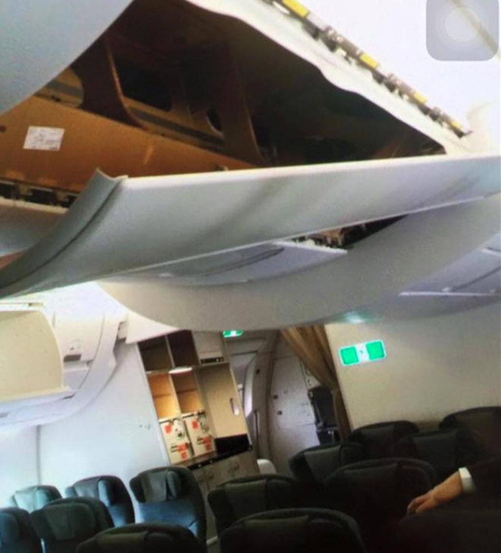 Ceiling panel torn from Cathay Pacific Airbus